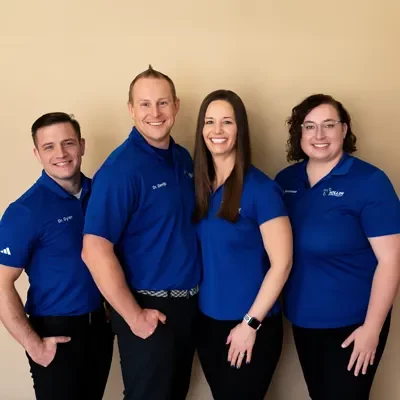 Chiropractor Jefferson City MO Derrijk Hollon With Team About